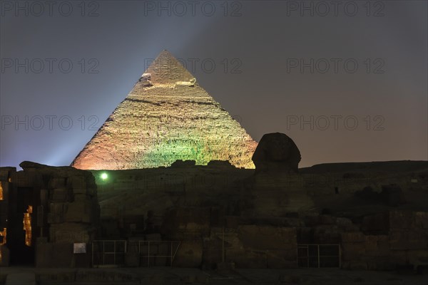 Sound and light show at the beautiful pyramids and sphinx of Giza. Night in the city of Cairo. Africa