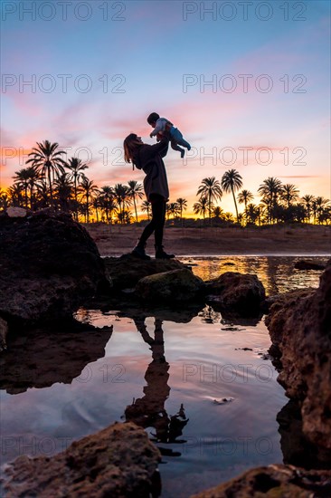 Lifestyle of a family on the beach enjoying summer vacation