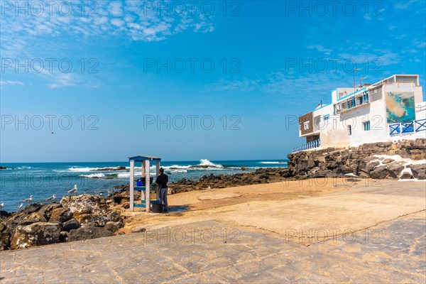 A fish cutter from a restaurant in the tourist town of El Cotillo in the north of the island of Fuerteventura