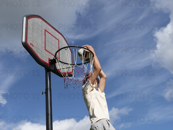 Basketball Jump with the ball to the basket and net