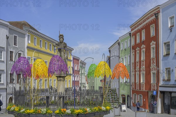 Fountain and old houses on the lower town square