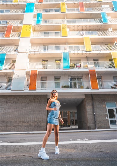 Girl with a skirt enjoying the city in summer