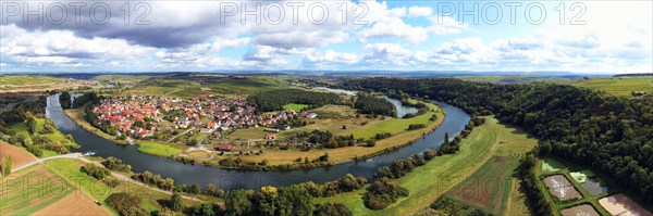 The Mainschleife near Volkach winds through the valley and is surrounded by fields and vineyards. Volkach