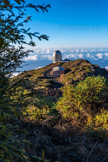 Observatories of the Roque de los Muchachos in the Caldera de Taburiente with a sea of nuts below one summer afternoon