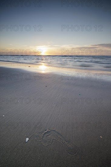 Sunset on the beach of De Panne