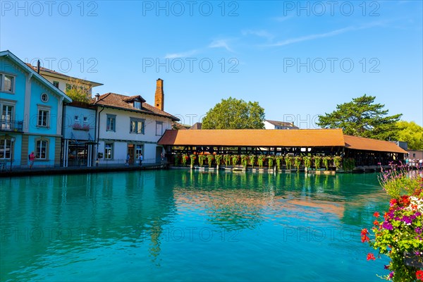 River Aare in City of Thun and Untere Schleuse Bridge in a Sunny Summer Day in Thun