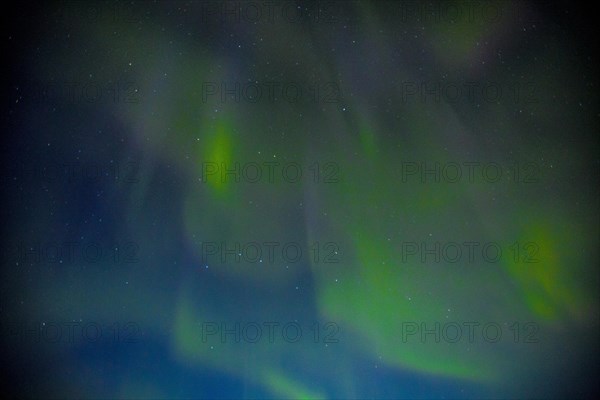 Green lights of the beautiful Northern Lights on the Reykjanes peninsula in southern Iceland