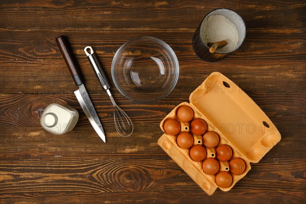 Top view of kitchen table with ingredients for scrambled egg