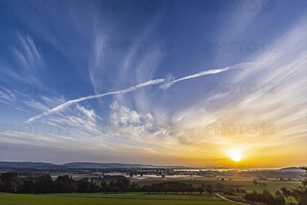 Sunrise at Lake Constance nature reserve Zeller Aachried with autumn fog