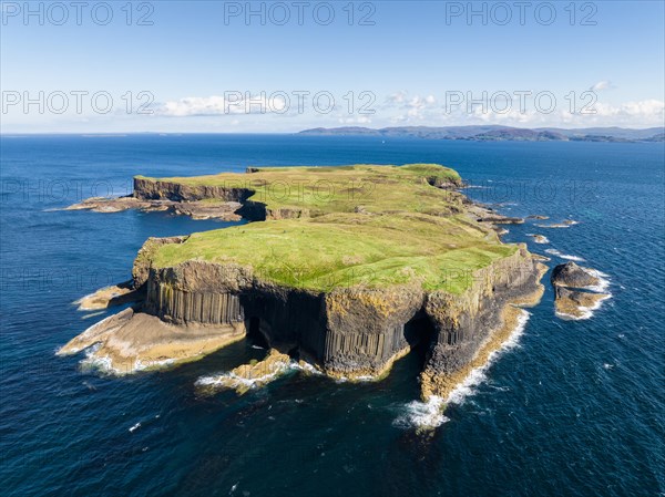 Aerial view of the uninhabited rocky island of Staffa with the prominent basalt columns and Fingal's Cave