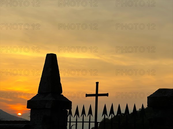 Railing with a Cross in Sunset in Malcantone