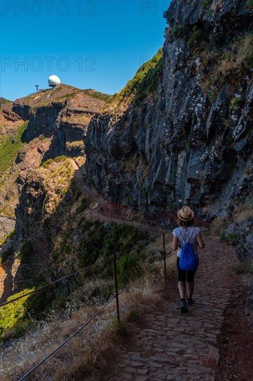 A young woman on the trail to the Ninho da