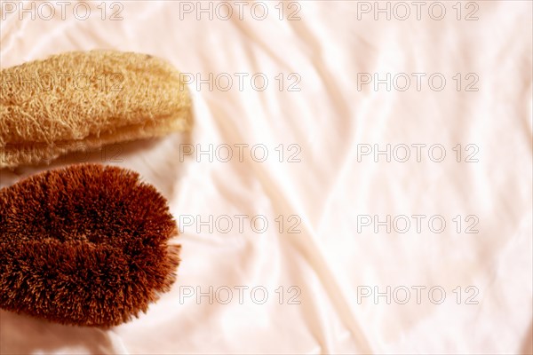 An organic bristled body brush and a loofah sponge