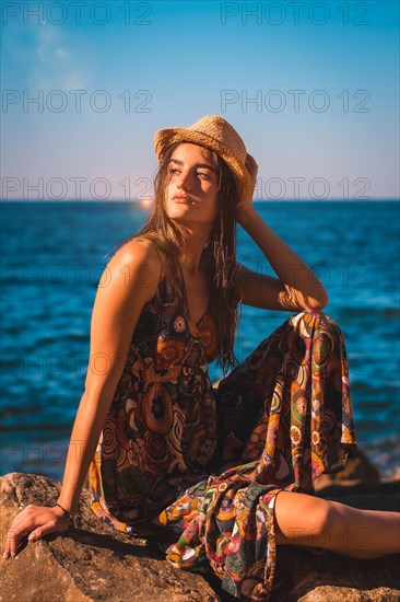 A young Caucasian woman looking left with wet hair