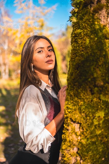 A young Caucasian brunette college girl