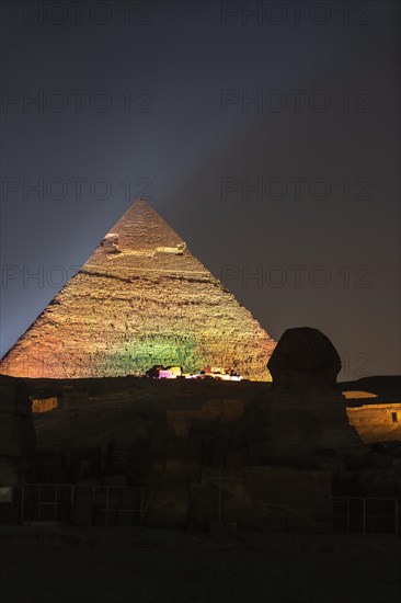 Sound and light show at the beautiful pyramids and sphinx of Giza. Night in the city of Cairo. Africa