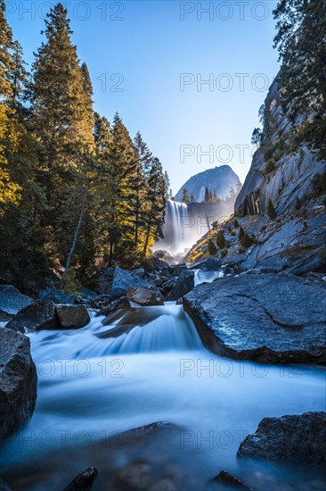 Vernal Falls waterfall of Yosemite National Park from the water that falls on the stones