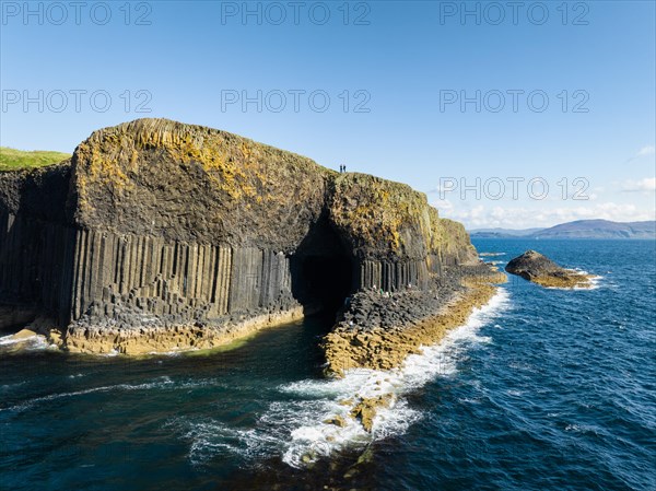 Aerial view of the uninhabited rocky island of Staffa with the prominent basalt columns and Fingal's Cave