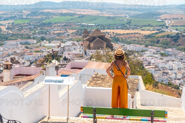 A tourist looking at the tourist town of Arcos de la Frontera in Cadiz