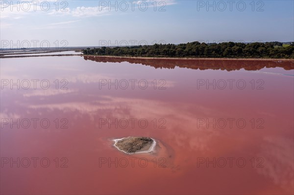 Aerial view of a salt works with salt island