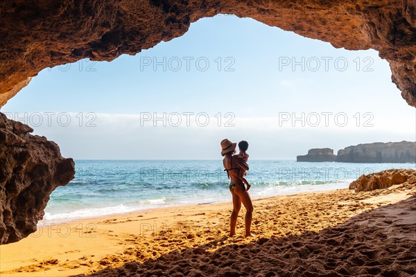 With the son in the natural beach cave in the Algarve at Praia da Coelha