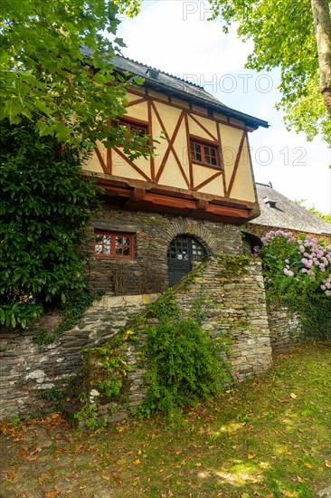 Old colored house in the medieval village of Rochefort-en-Terre