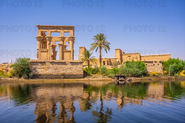 The beautiful temple of Philae and the Greco-Roman buildings seen from the Nile river