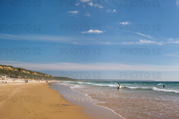 Sandy Atlantic ocean beach at Fonte da Telha beach