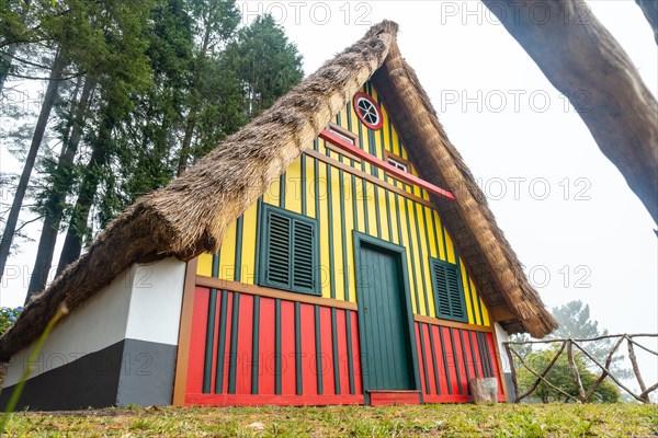 Traditional Madeiran house like those of Santana in the forest of Caldeirao Verde