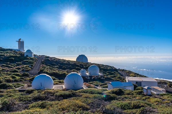 Observatories of the Roque de los Muchachos in the Caldera de Taburiente with a sea of nuts below one summer afternoon