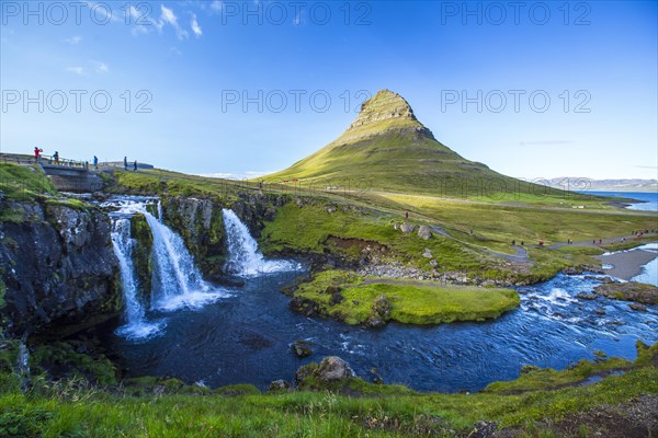 The famous Icelandic mountain Kirkjufell and the small waterfalls