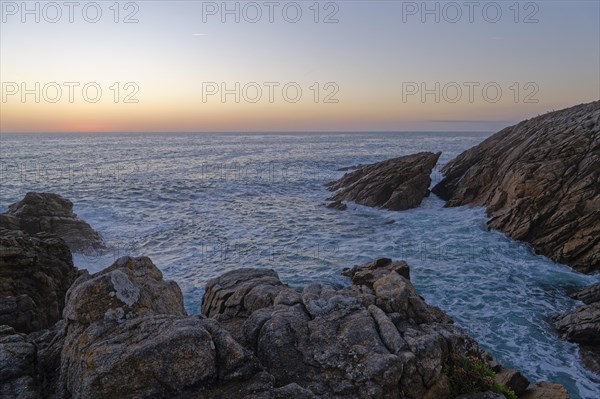 Evening atmosphere on the Cote Sauvage. The Wild Coast is a rocky coast in the west of the Quiberon peninsula in Brittany. Cores