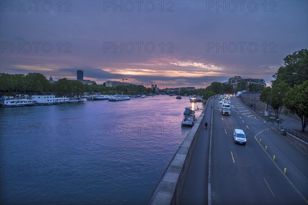 Evening view of the Seine with the towers of Notre Dame in the background