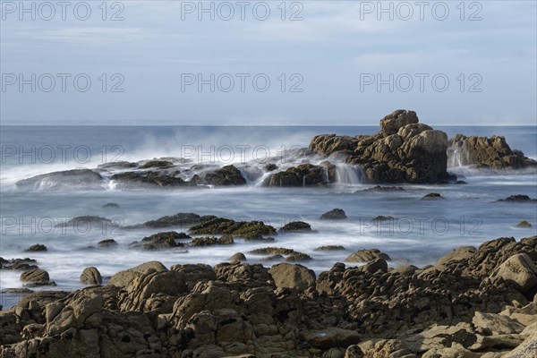 Surf on the rocky coast off Penmarch on the Atlantic Ocean. Brittany