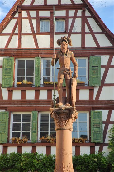 Market fountain with medieval sculpture