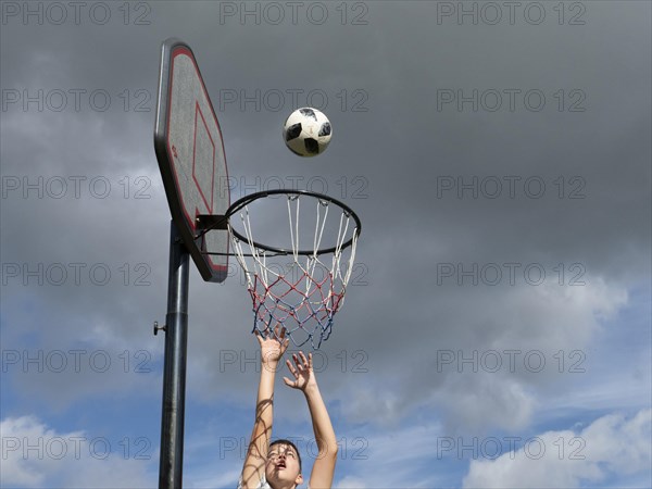 Basketball Jump with the ball to the basket and net