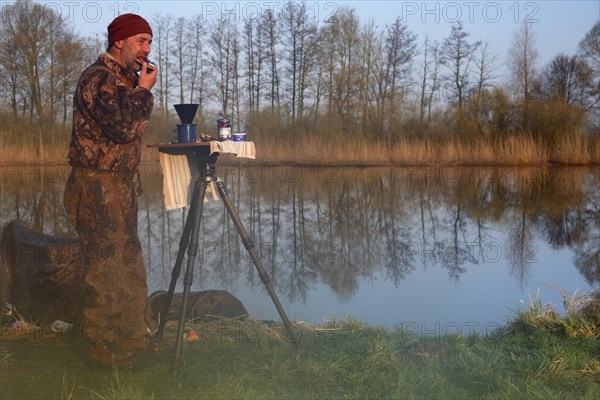 Man having breakfast in nature