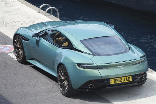 Aston Martin DB12 sports car in turquoise