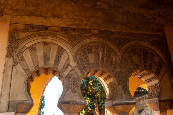 Detail of precious Arabic windows and doors inside the Alcazaba in the city of Malaga