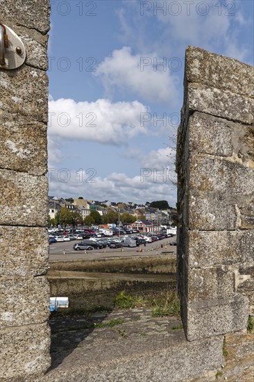 View through an embrasure of the massive wall surrounding the old town