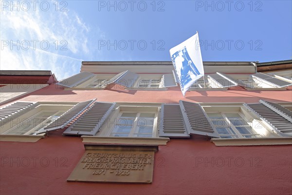 Friedrich Ebert House with flag and view upwards