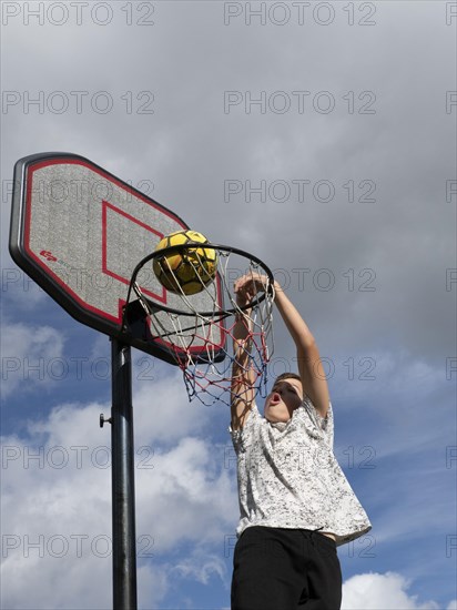 Basketball Jump with the ball to the basket and net