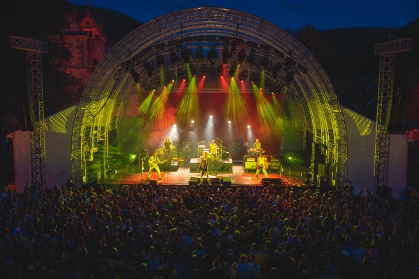 Cheering crowd at Live Klostersommer Festival in Historic Monastery