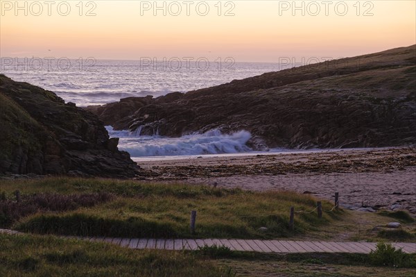 Evening atmosphere on the Cote Sauvage. The Wild Coast is a rocky coast in the west of the Quiberon peninsula in Brittany. Cores