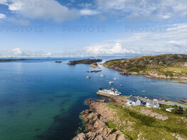 Aerial view of the Fionnphort ferry terminal with the ferry MV Loch Buie of the shipping company Caledonian MacBrayne operating a scheduled service between Fionnphort and the Isle of Iona