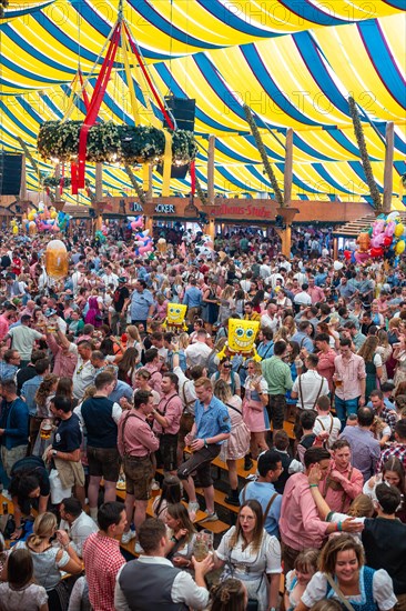 Beer tent full of drunken people