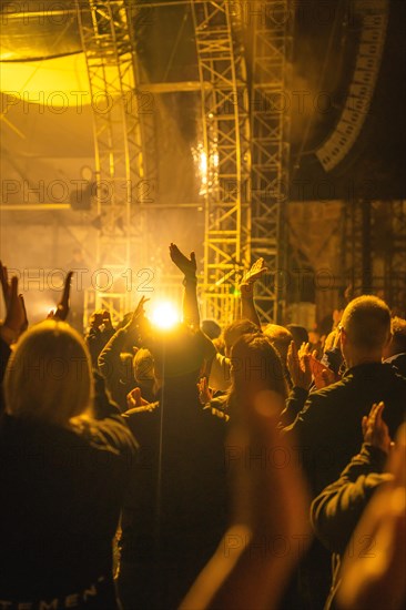 Cheering crowd at Live Klostersommer Festival in Historic Monastery