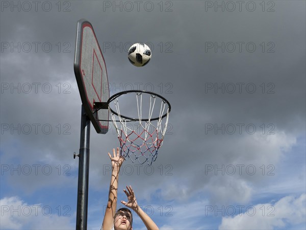 Basketball Jump with the ball to the basket and net