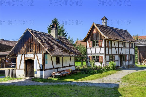 Two half-timbered houses with brick chimneys in the Swabian Open Air Museum