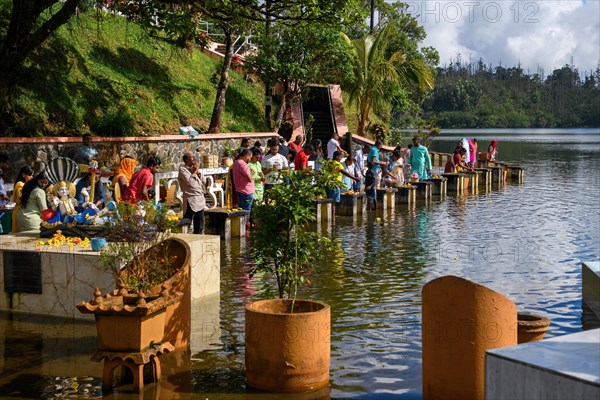 Devout Hindus make sacrifices to Hindu deities Religious site largest Hindu sanctuary Sanctuary for religion Hinduism outside India for devout Hindu Hindus Saint lake Crater lake Grand Bassin Ganga Talao